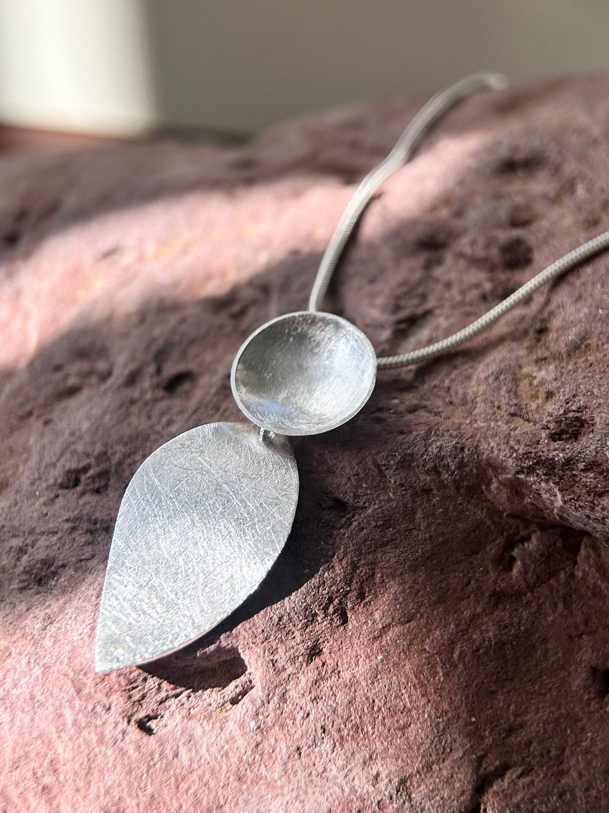 Round and Petal Brushed Silver Pendant