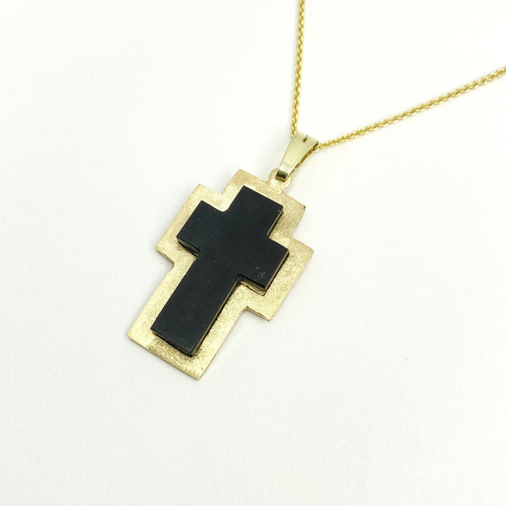 Cross shaped Carraig Dubh stone with 14k Gold