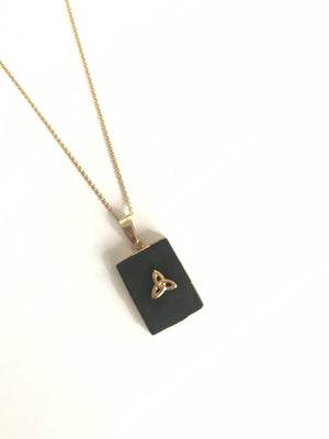 Heritage necklace. Black gemstone surrounded by 14k gold. Gold Trinity Knot with 14k chain